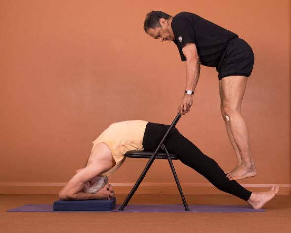 Father Joe at work, Yoga Teacher Magazine